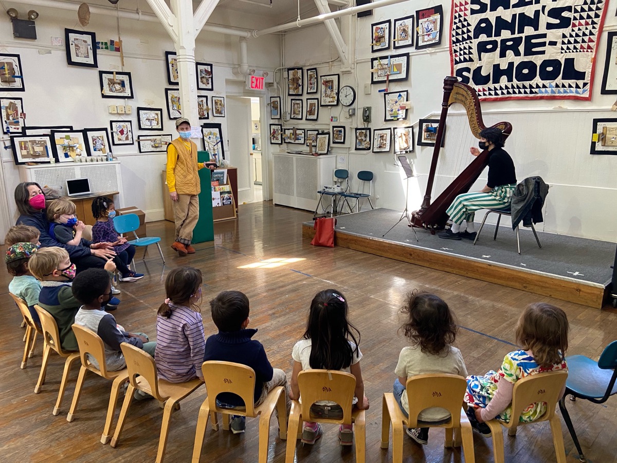 Group harp class in Brooklyn - Children learning harp with Esther Sibiude